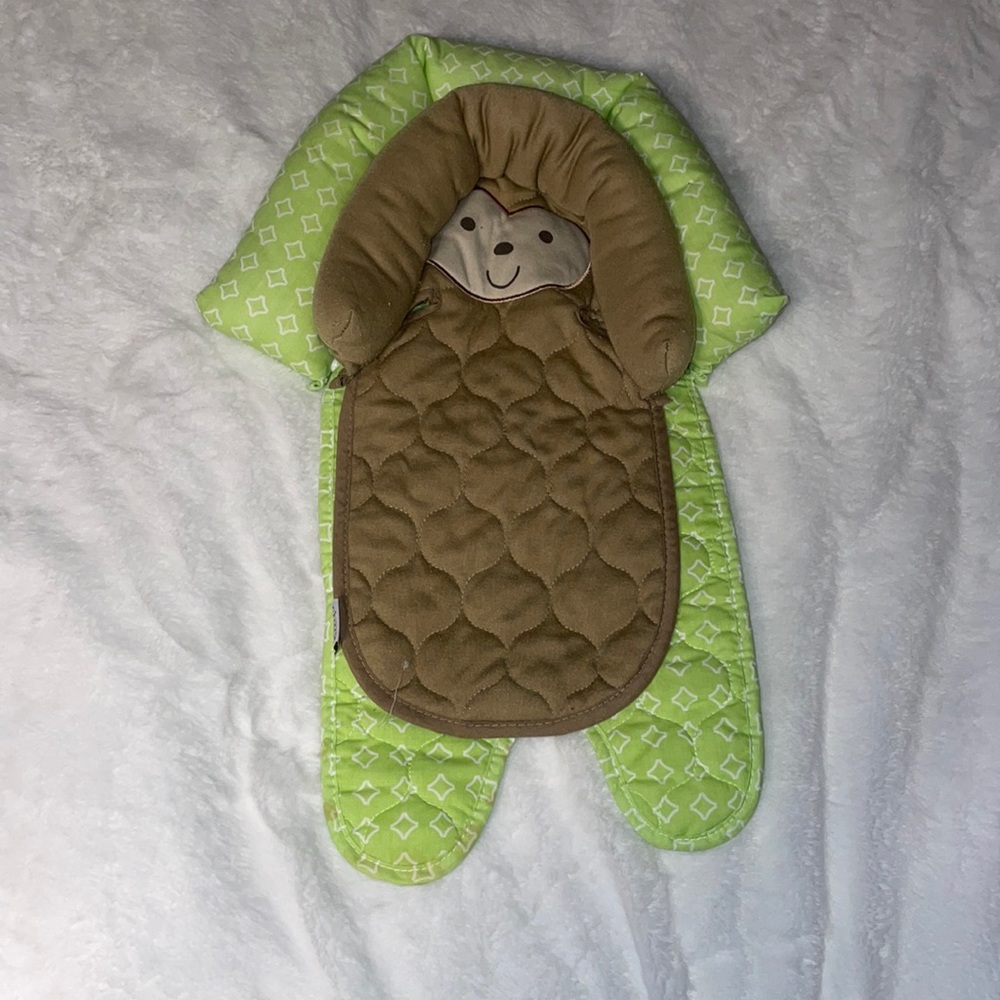 Carter’s Child of mine monkey with green head support for car seat